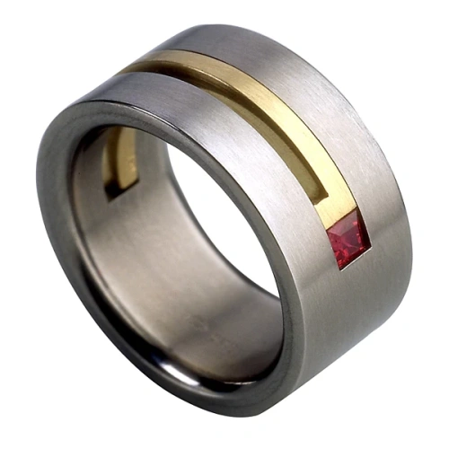 Trouwring van titanium en geelgoud met natuurlijke robijn 9 mm