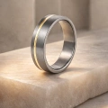 AH-Nova-2-matte-titanium-trouwring-geelgoud.webp