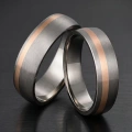 TRG63-5-4-titanium-trouwringen-roodgoud-mat.webp