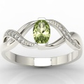 Pierścionek z 14k złota z oliwinem 0,60ct i 10 diamentami 0,04ct