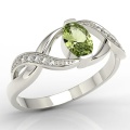 Pierścionek z 14k złota z oliwinem 0,60ct i 10 diamentami 0,04ct