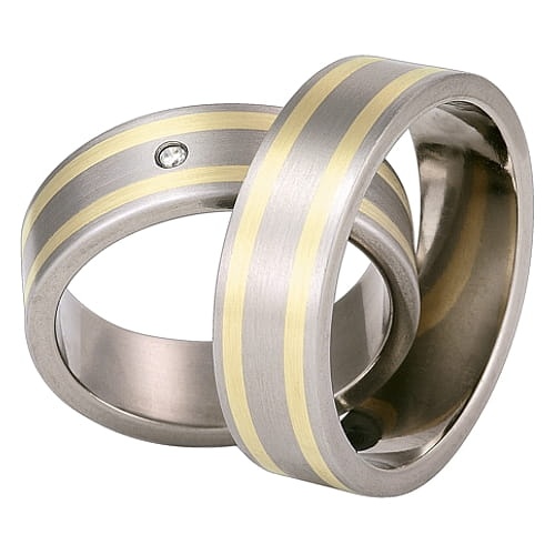 Obrączki z tytanu i żółtego złota z diamentem