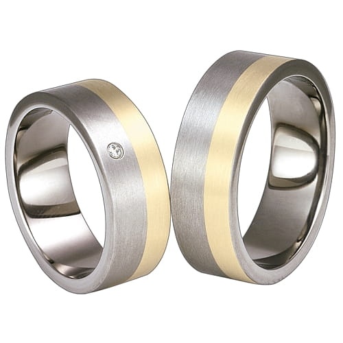 Obrączki z tytanu i żółtego złota z diamentem