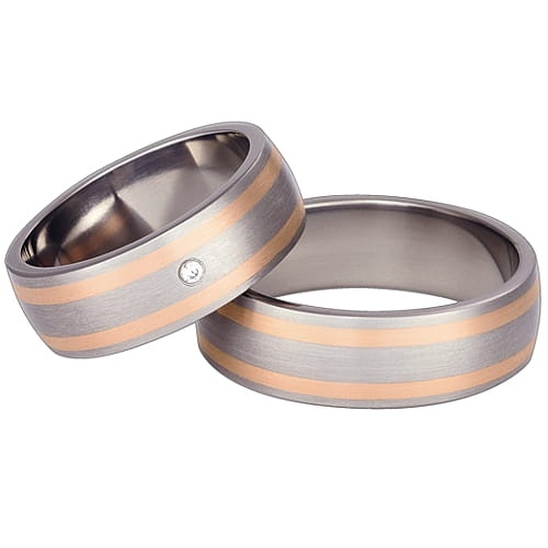 Obrączki z tytanu i czerwonego złota z diamentem