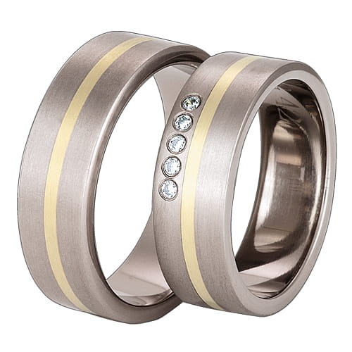 Obrączki z tytanu i żółtego złota z diamentami